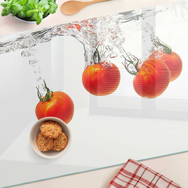 Tabla de cortar de cristal Tomates en agua