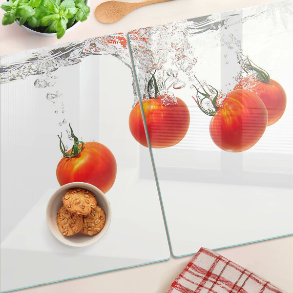 Tabla de cortar de cristal Tomates en agua