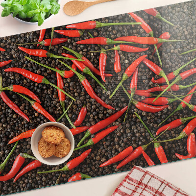 Tabla para cortar Chiles sobre pimienta negra