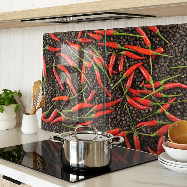 Tabla para cortar Chiles sobre pimienta negra