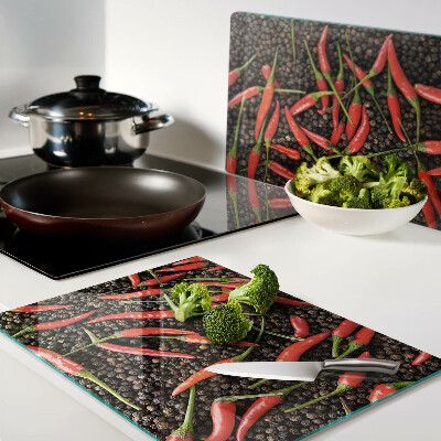 Tabla para cortar Chiles sobre pimienta negra