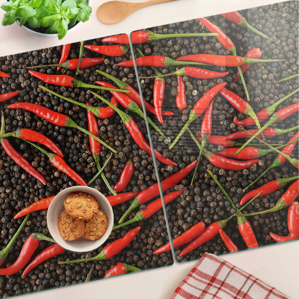 Tabla para cortar Chiles sobre pimienta negra