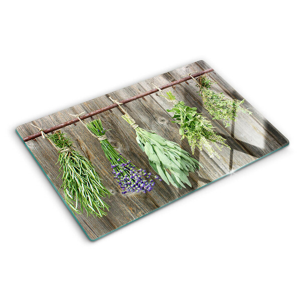 Tabla de cortar Hierbas sobre un fondo de madera