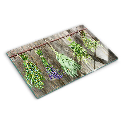 Tabla de cortar Hierbas sobre un fondo de madera