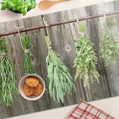 Tabla de cortar Hierbas sobre un fondo de madera