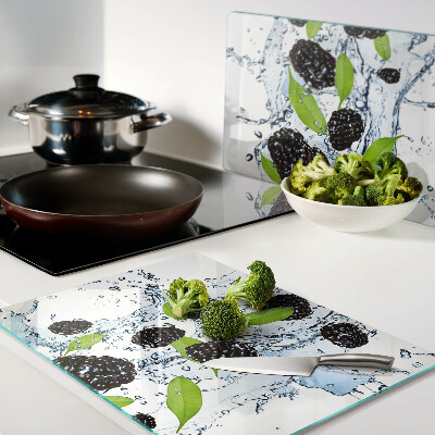 Tabla de cortar de cristal Fruta en agua