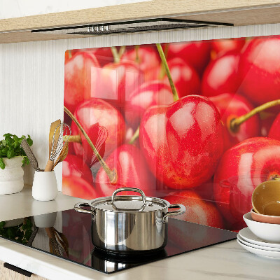 Tabla de cortar de cristal Cerezas sobre fondo rojo