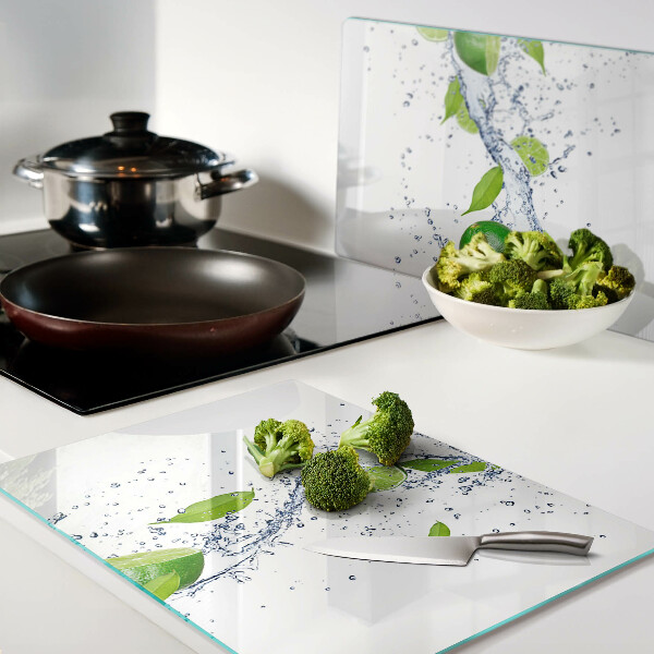 Tabla de cortar de cristal Limones y agua de hojas