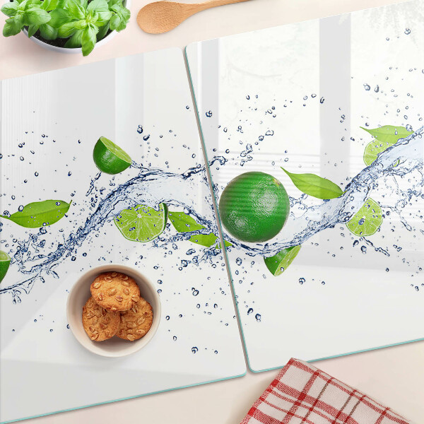 Tabla de cortar de cristal Limones y agua de hojas
