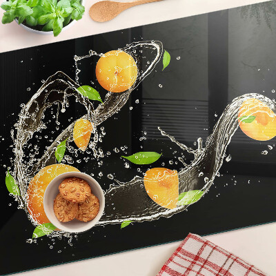 Tabla de cortar Frutas cítricas en agua