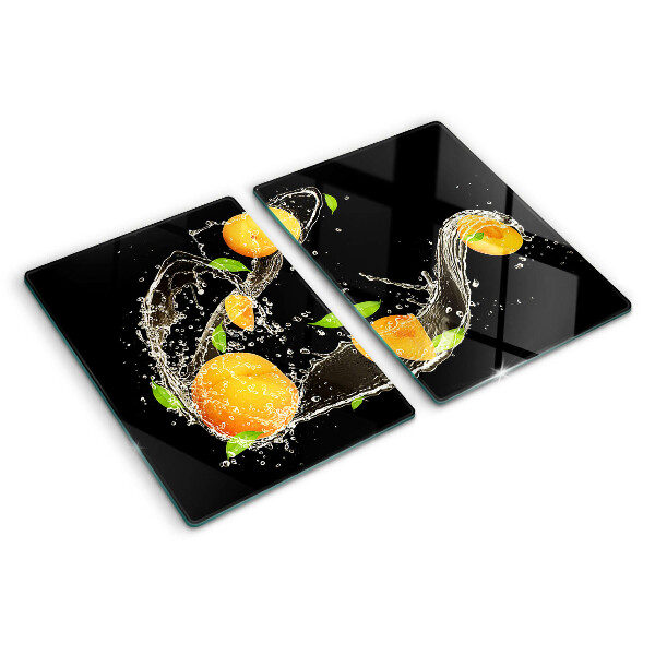 Tabla de cortar Frutas cítricas en agua