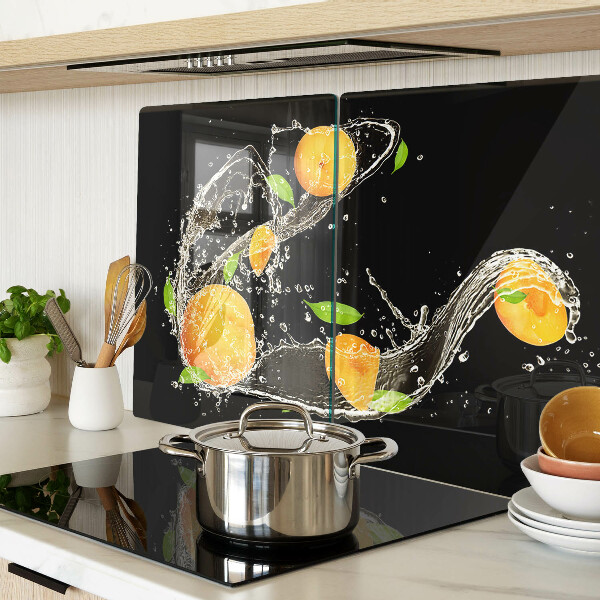 Tabla de cortar Frutas cítricas en agua