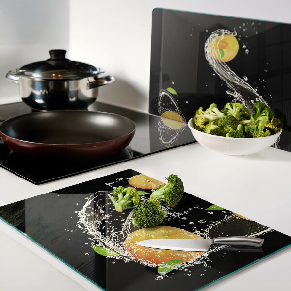 Tabla de cortar Frutas cítricas en agua