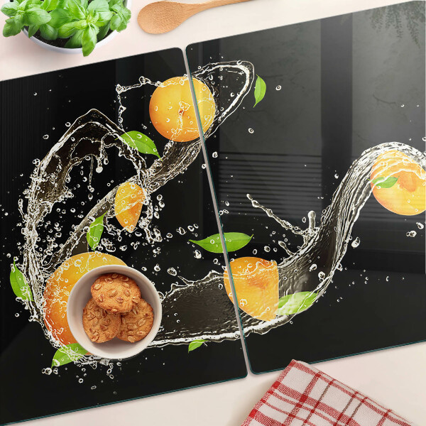 Tabla de cortar Frutas cítricas en agua