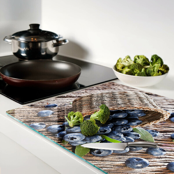 Tabla de cortar de cristal Bayas en una cesta