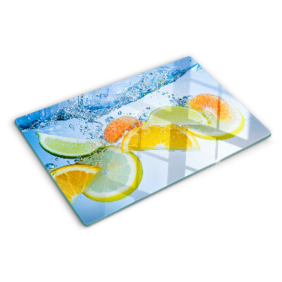 Tabla de cortar de cristal Frutas cítricas en agua