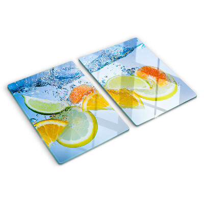 Tabla de cortar de cristal Frutas cítricas en agua