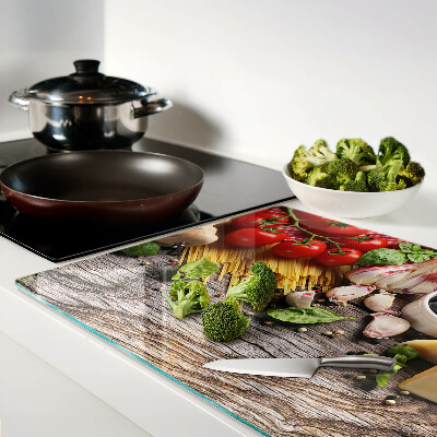 Tabla para cortar Cocina italiana con pasta y verduras.