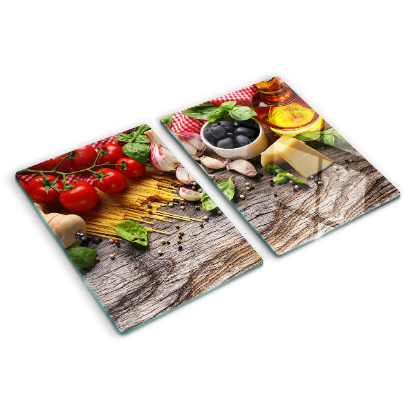 Tabla para cortar Cocina italiana con pasta y verduras.