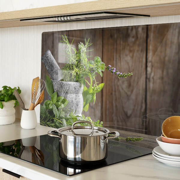 Tabla de cortar de cristal Hierbas en una olla