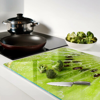 Tabla de cortar de cristal Kiwi con gotas de agua