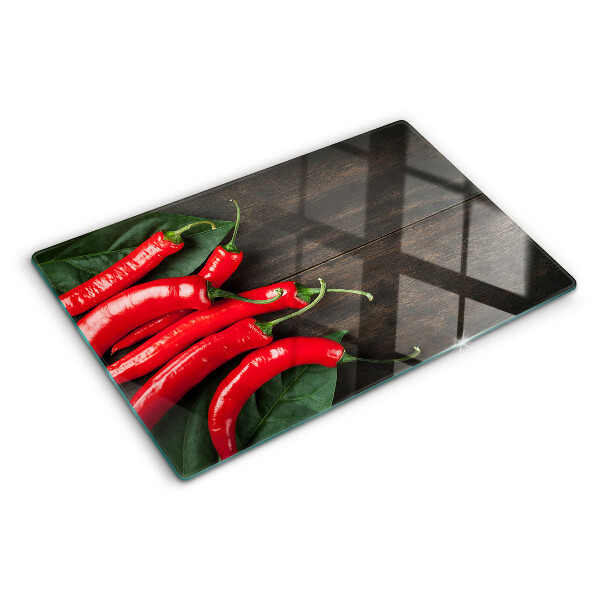 Tabla para cortar Chiles sobre un fondo de madera