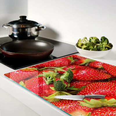 Tabla de cortar de cristal Fresas en el fondo