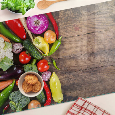 Tabla para cortar Verduras sobre un fondo de madera