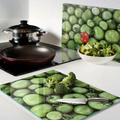 Tabla de cortar Tomates verdes con acento rojo.