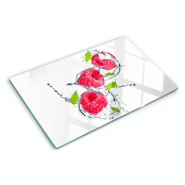 Tabla de cocina Frambuesas en agua con hojas
