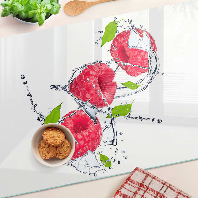 Tabla de cocina Frambuesas en agua con hojas