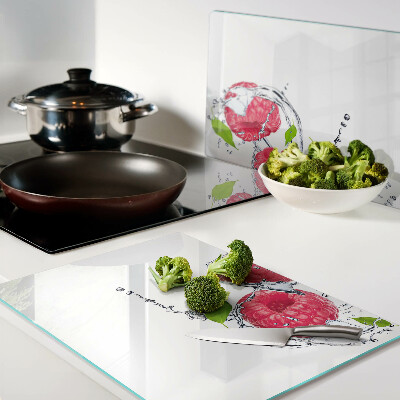 Tabla de cocina Frambuesas en agua con hojas