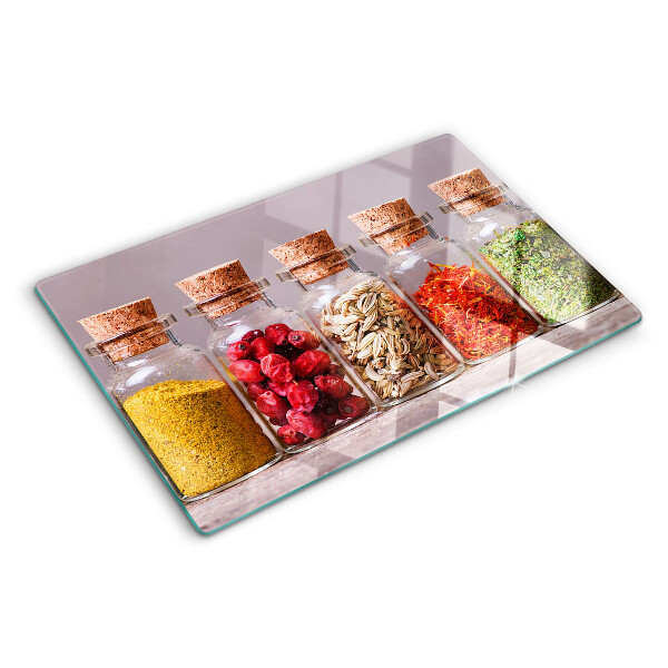 Tabla de cortar de cristal Especias en frascos de vidrio