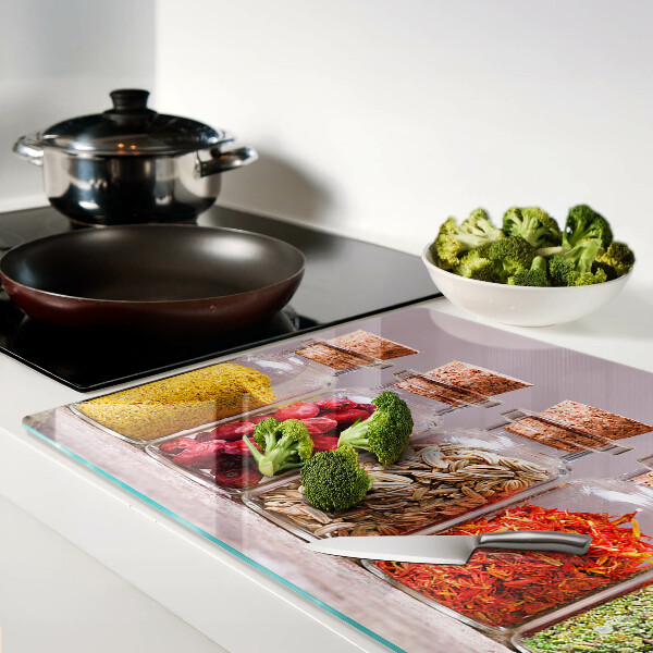 Tabla de cortar de cristal Especias en frascos de vidrio