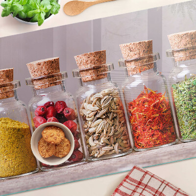 Tabla de cortar de cristal Especias en frascos de vidrio