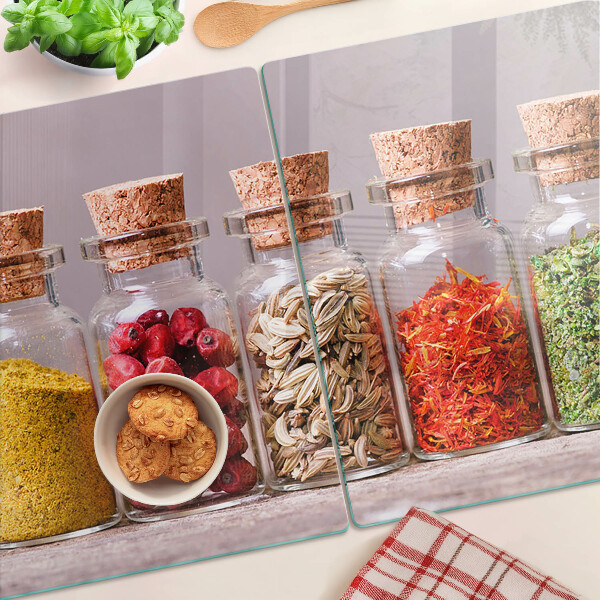 Tabla de cortar de cristal Especias en frascos de vidrio