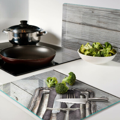 Szklana deska do krojenia Rustykalne sztućce na drewnianym tle