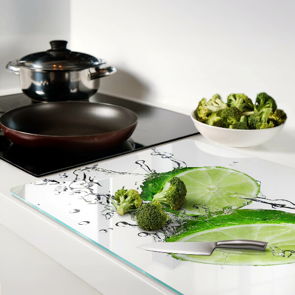 Tabla de cortar de cristal Limones en agua