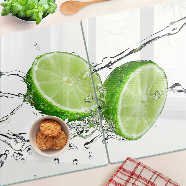 Tabla de cortar de cristal Limones en agua