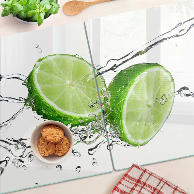 Tabla de cortar de cristal Limones en agua