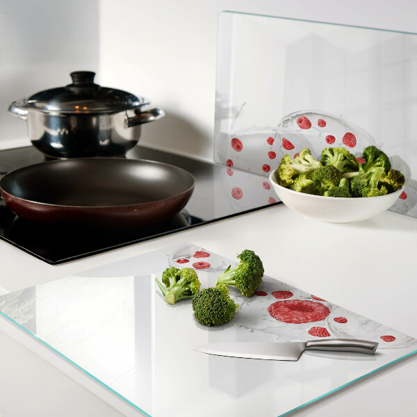 Tabla de cortar de cristal Burbujas de frambuesa en el agua