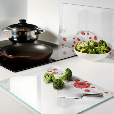 Tabla de cortar de cristal Burbujas de frambuesa en el agua