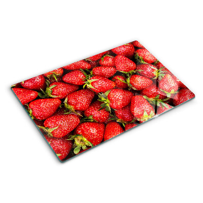 Tabla de cortar Fresas sobre fondo rojo