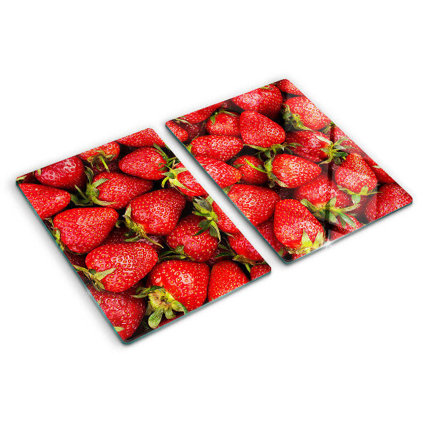 Tabla de cortar Fresas sobre fondo rojo
