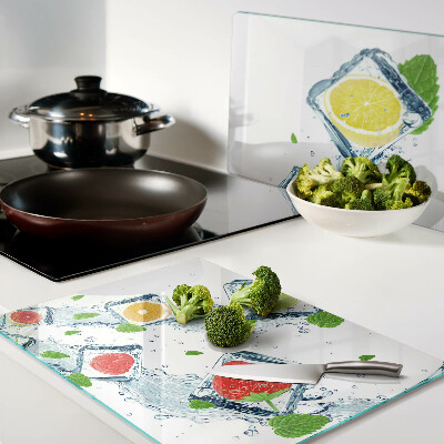 Tabla de cocina Motivo de fruta con rodajas de colores.