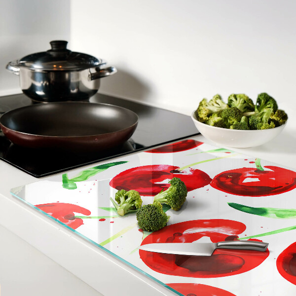 Tabla para cortar Cerezas rojas sobre fondo blanco