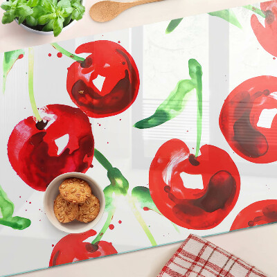Tabla para cortar Cerezas rojas sobre fondo blanco