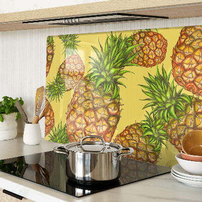 Tabla de cortar de cristal Piñas sobre un fondo amarillo