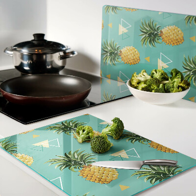 Tabla de cocina Piñas sobre un fondo turquesa