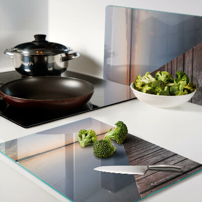 Tabla para cortar Muelle en el lago al atardecer